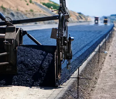 Asphalt crew resurfacing in Port St Lucie Florida