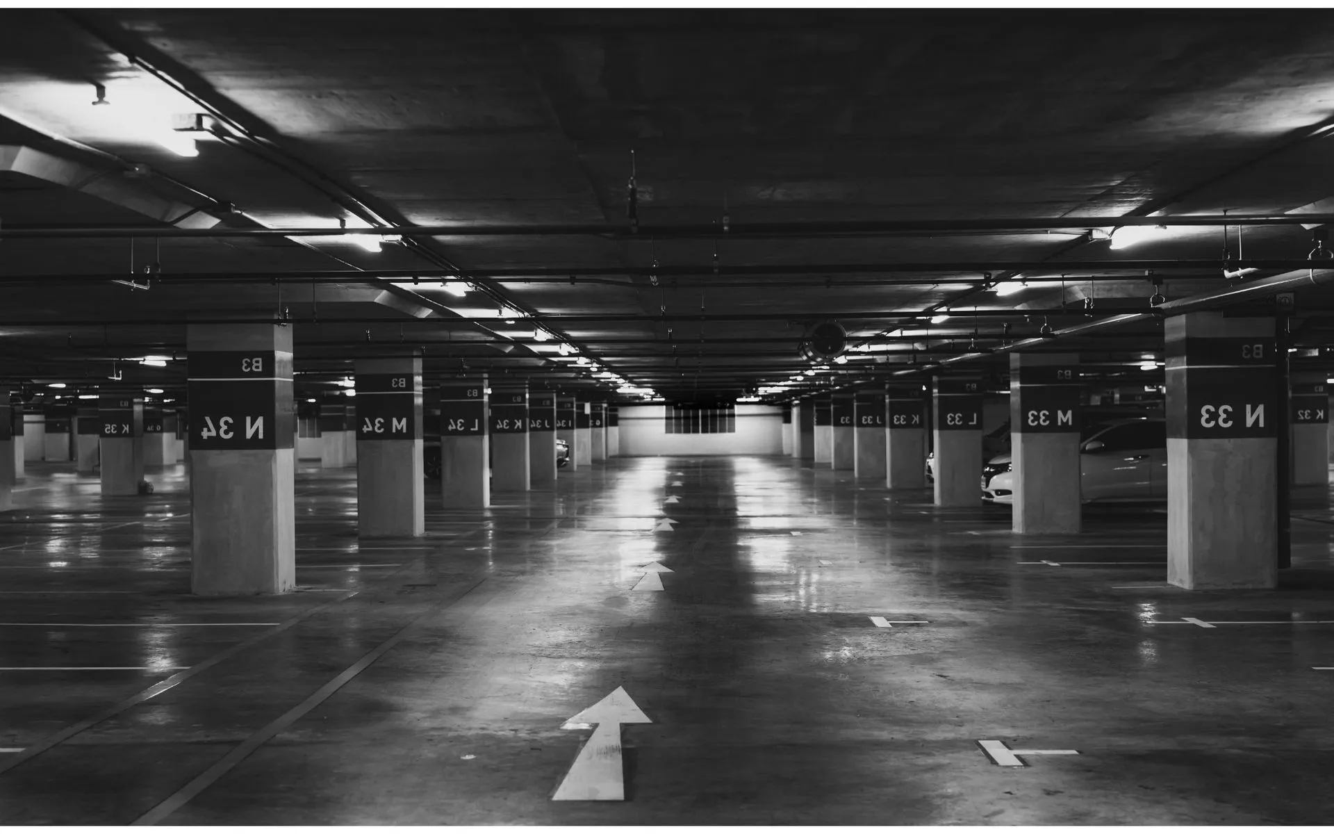 underground industrial parking lot with blacktop sealing